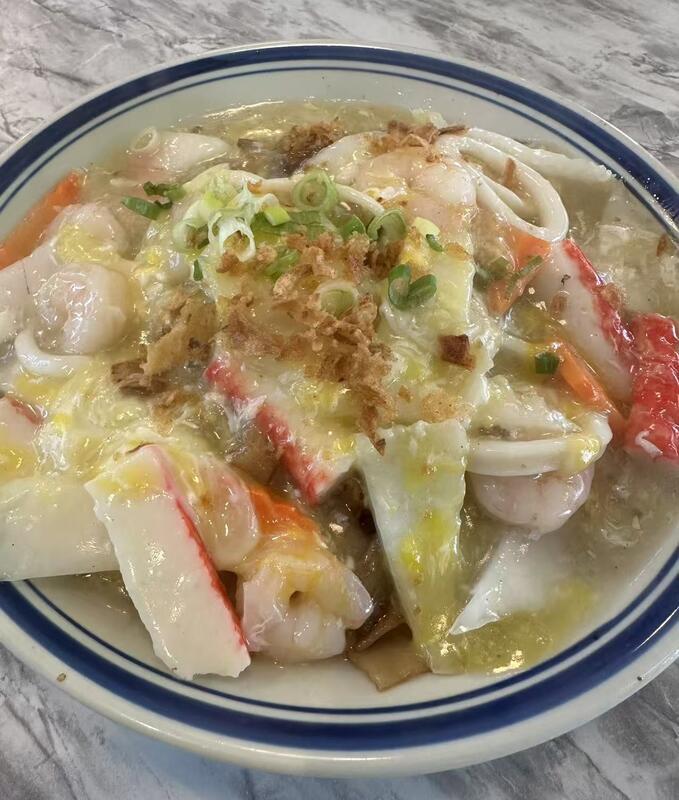 F13. Stir-Fried Seafood Flat Noodle w/Scramble Egg